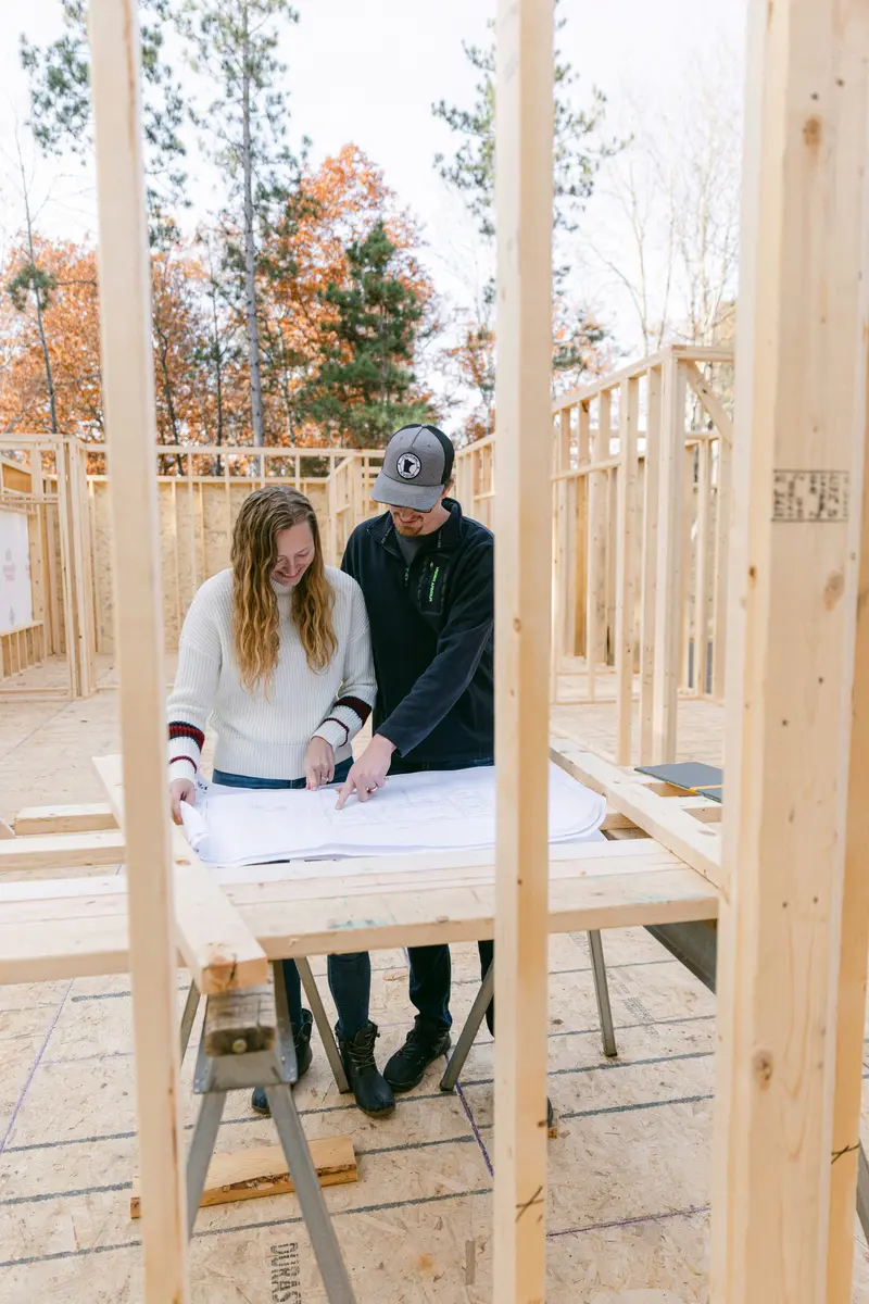 Bathroom Renovation Burlington team discussing project plans with a client
