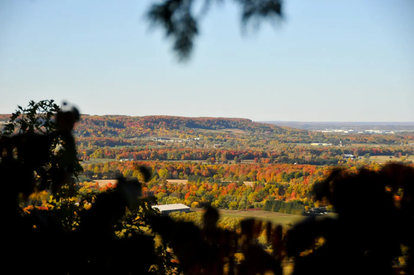 Autumn view of the Niagara Escarpment's forested ridge and valley, visible from Headon Forest's north end in Burlington, Ontario